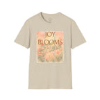 Joy Blooms Here – Christian Floral Encouragement Tee