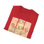 Joy Blooms Here – Christian Floral Encouragement Tee